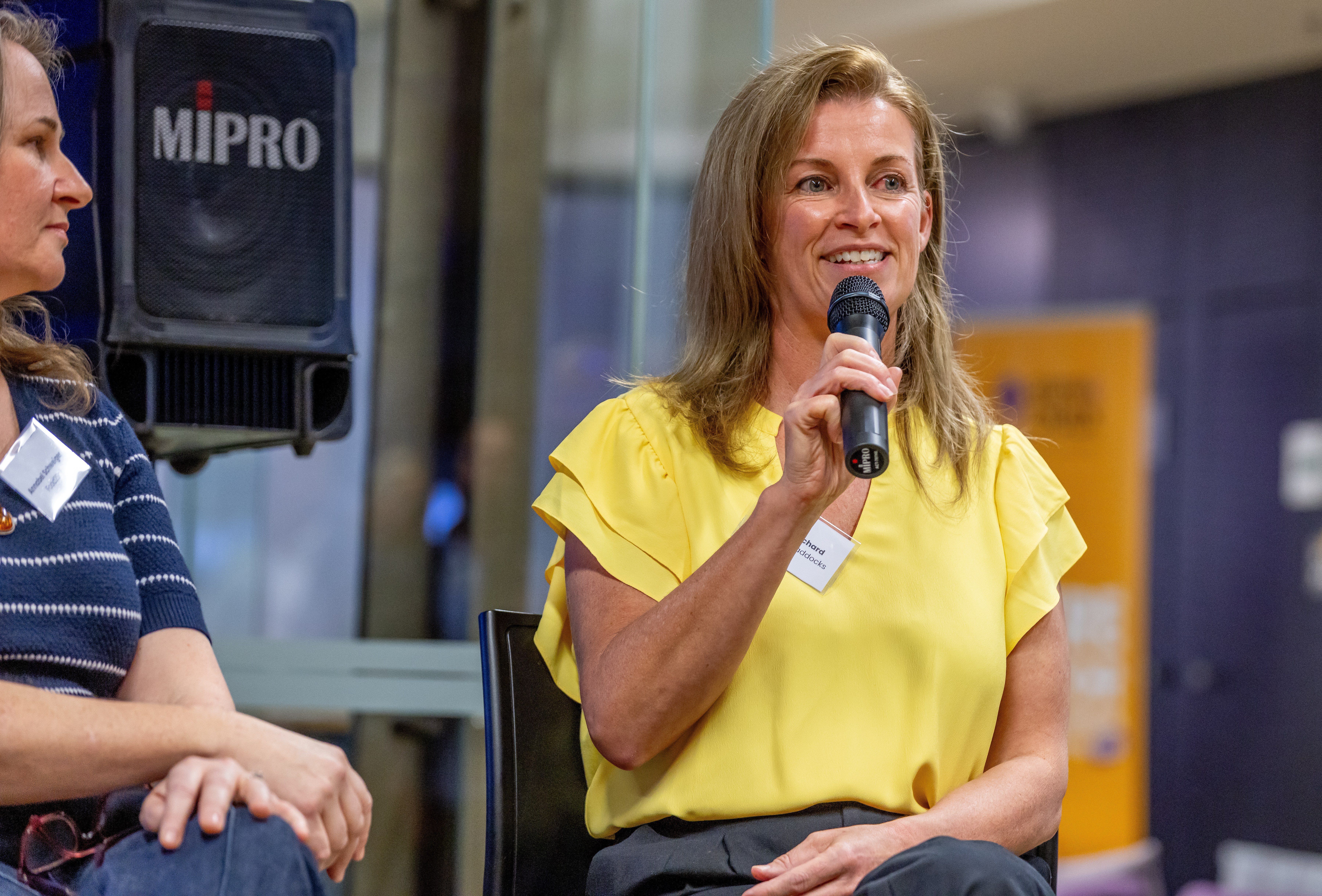 Sam speaking on an industry panel